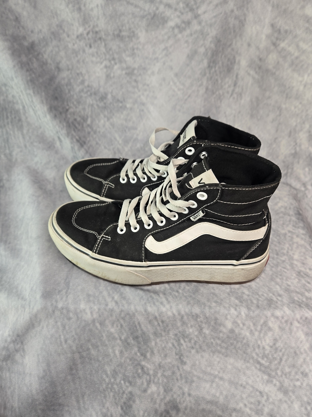 Vans Black and White High-Top Skate Sneakers
